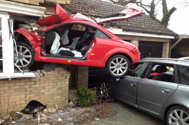 Red Audi TT that crashed into a house in uk-8